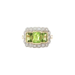 Gold ring with peridot and diamond 14 kt