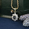 vintage Gold vintage entourage pendant with sapphire and diamond 14 kt
