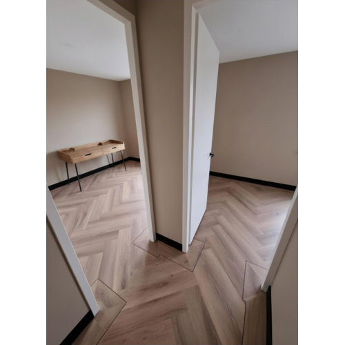 Floorlife YUP Mayfair herringbone dryback warm oak
