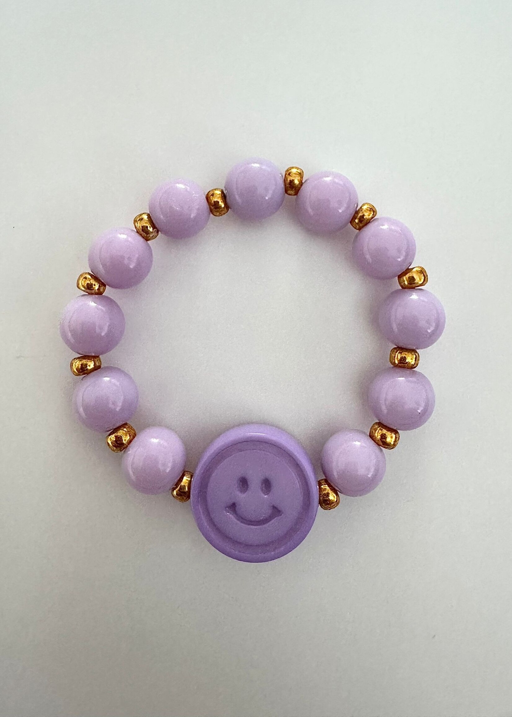 Armbandje smiley paars - By melo