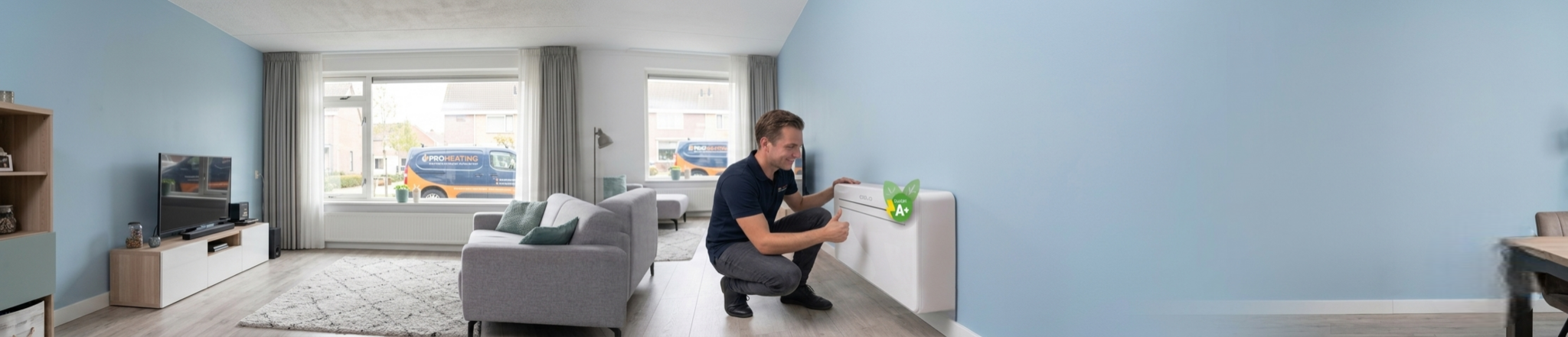Proheating installateur monteert een Oslo monoblock airco staand op de vloer tegen de muur