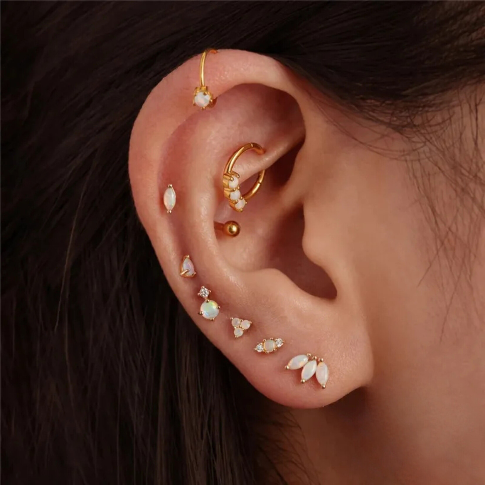 Carriez 925 zilveren gold plated crown piercing met 3 mini witte opaaltjes