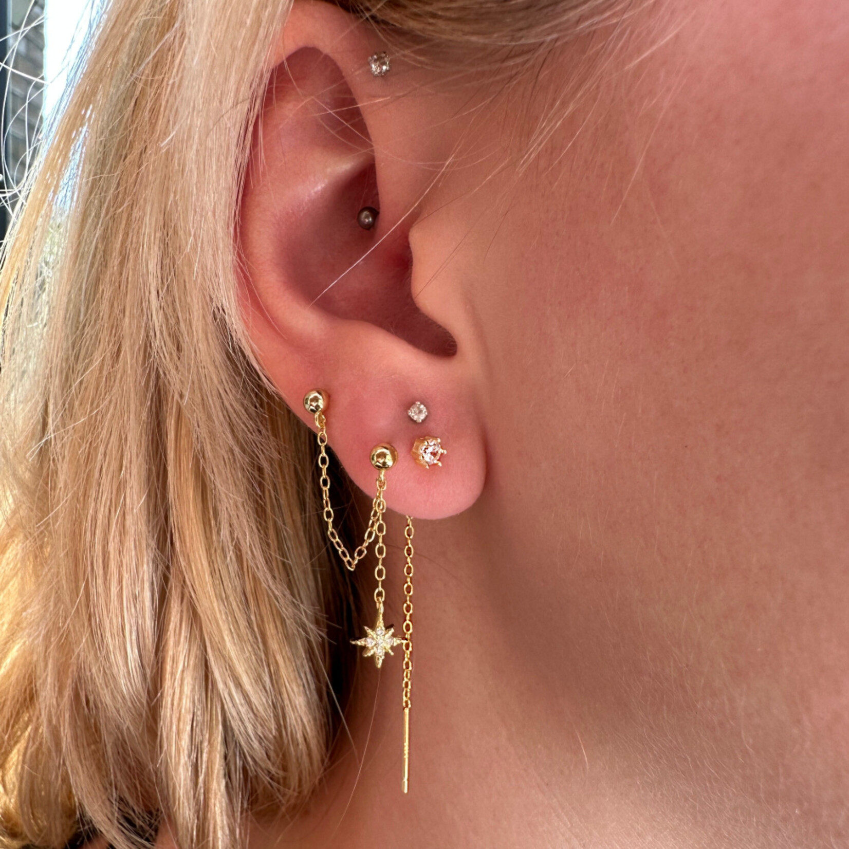 Carriez Zilveren of gold plated  doorhaal oorbellen zirkonia