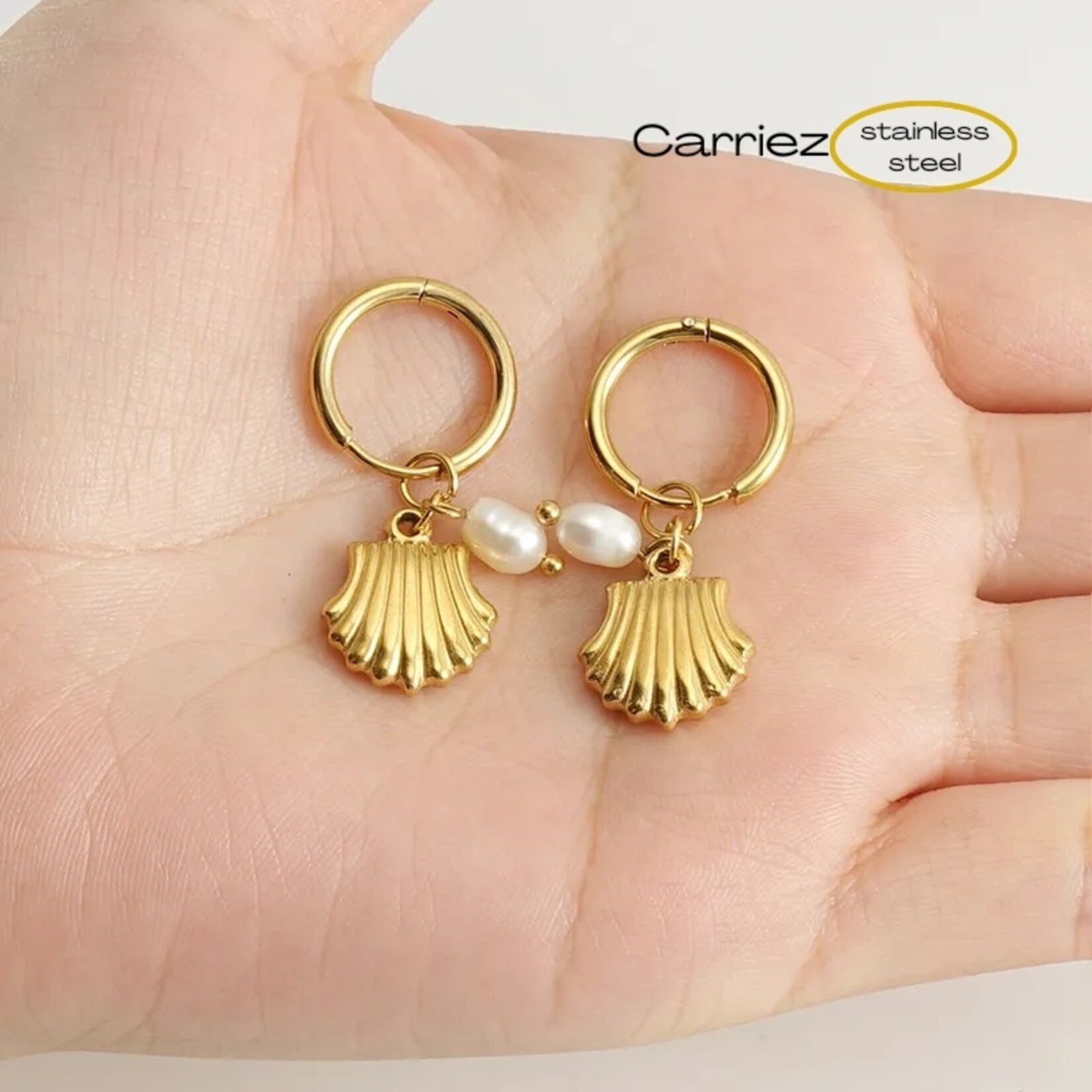 Carriez Gouden oorringen parel schelp - stainless steel