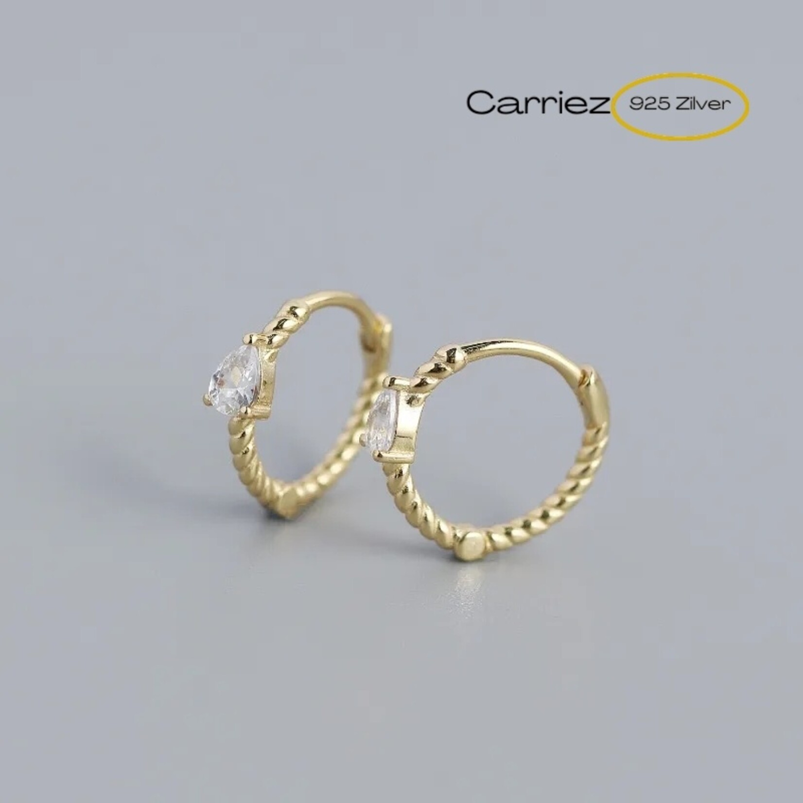 Carriez 925 zilveren twist oorringen met witte cz druppel