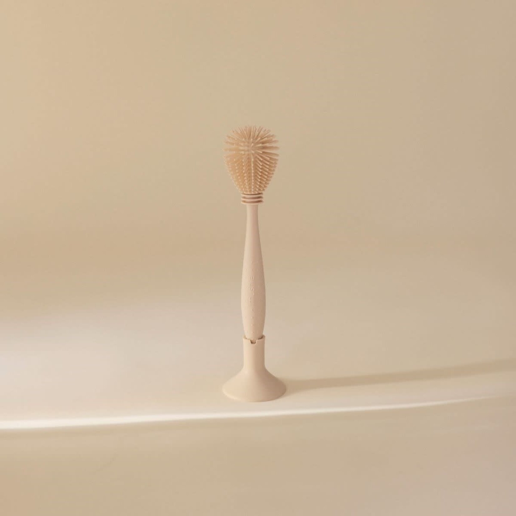 Mushie Goupillon Silicone Souple Shifting Sand