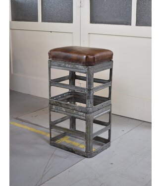 Metal stool with leather cushion