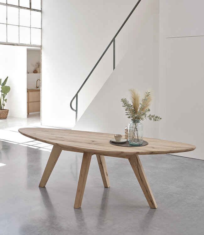 Pebble shaped oak dining table