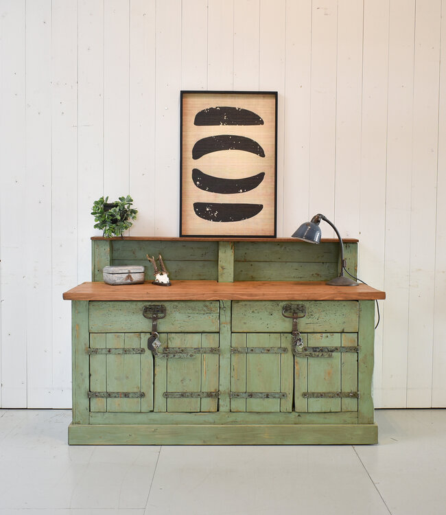 Green vintage wooden sideboard