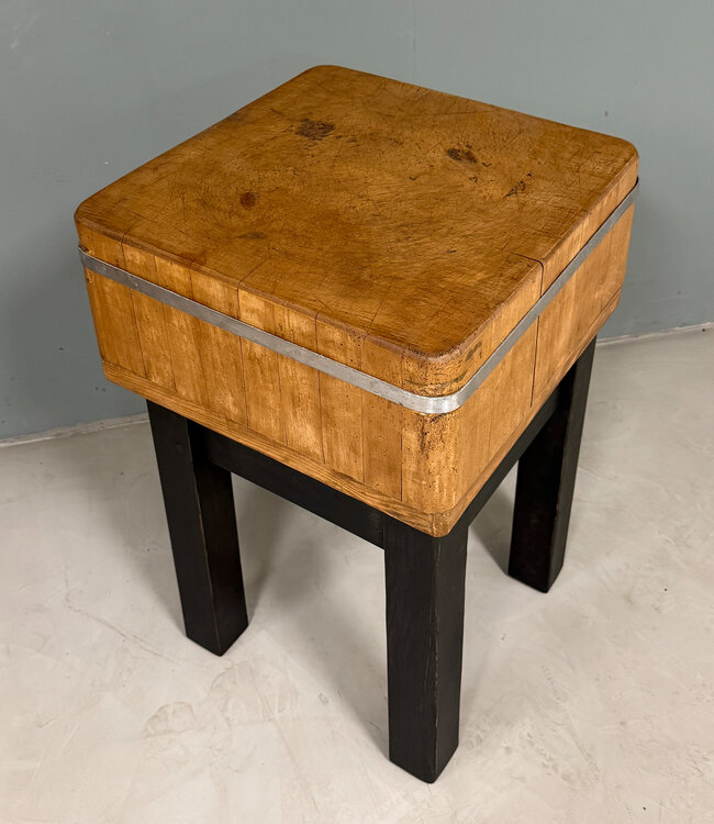 Vintage chopping block with black base