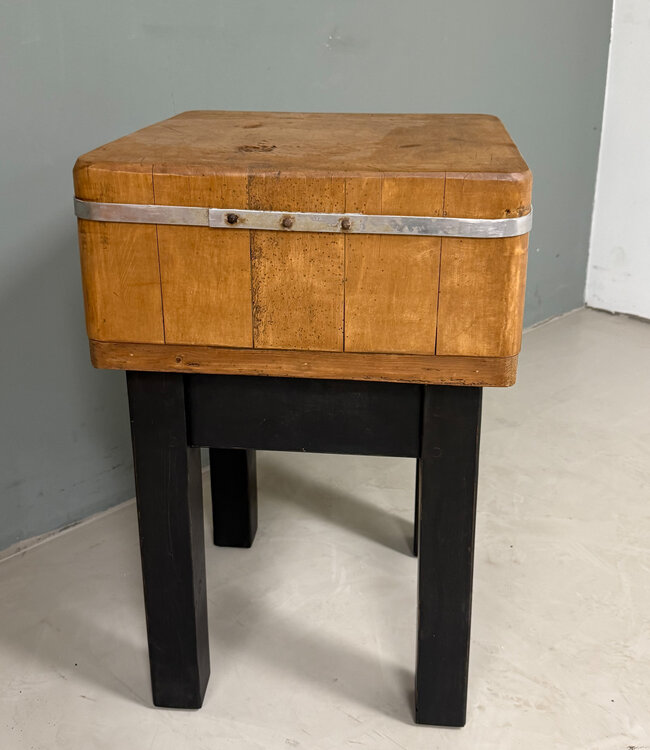 Vintage chopping block with black base