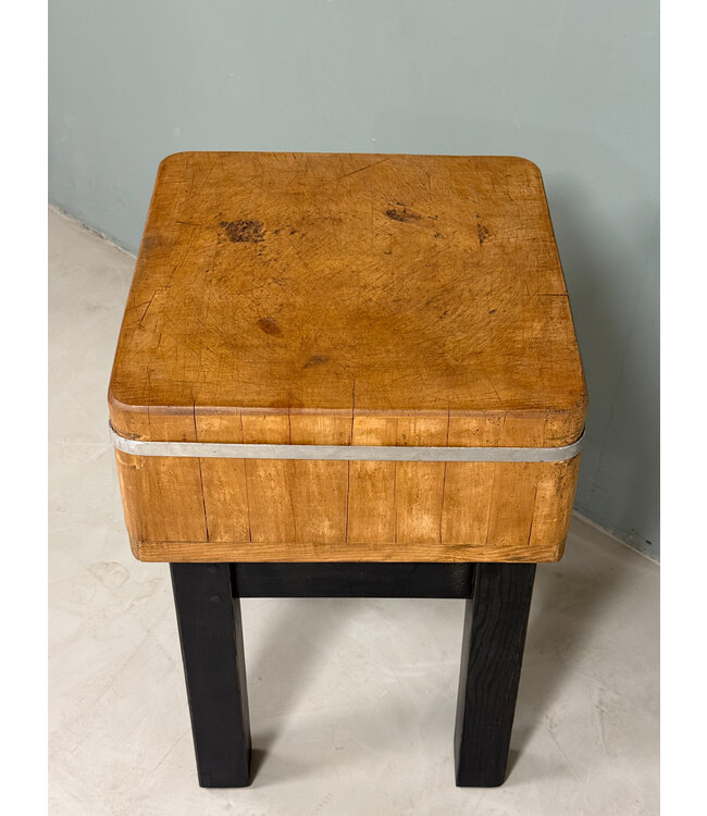 Vintage chopping block with black base