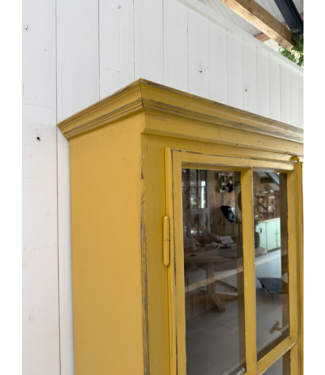 Vintage yellow display cabinet