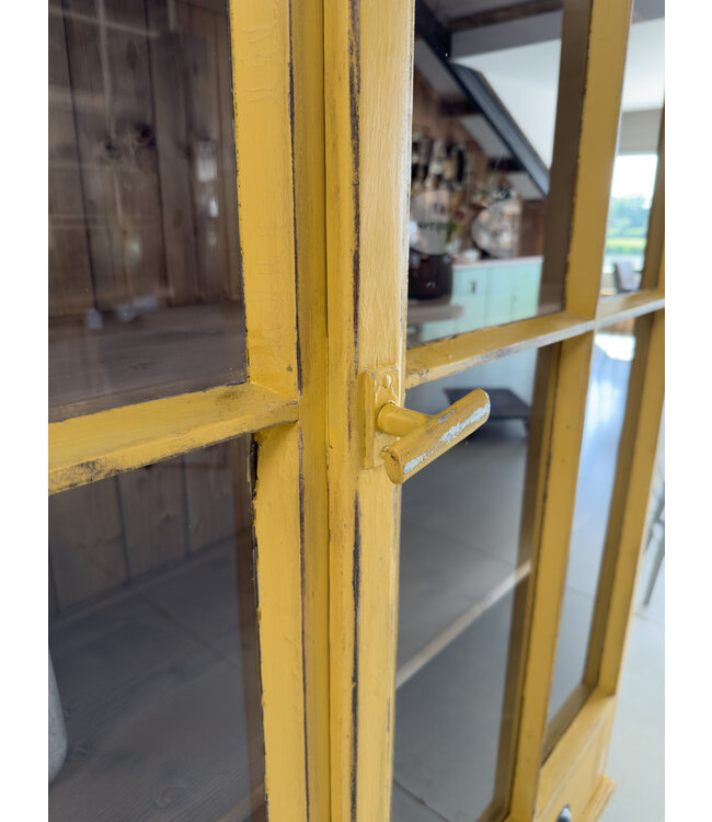 Vintage yellow display cabinet