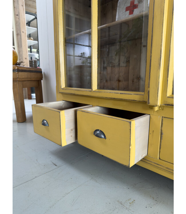Vintage yellow display cabinet