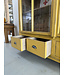 Vintage yellow display cabinet