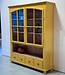 Yellow vintage wooden display cabinet