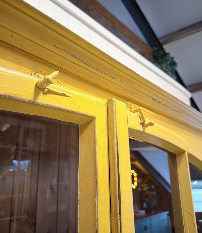 Yellow vintage wooden display cabinet