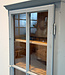 Gray vintage wooden display cabinet with old glass