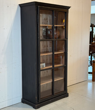 Black vintage wooden display cabinet with old glass