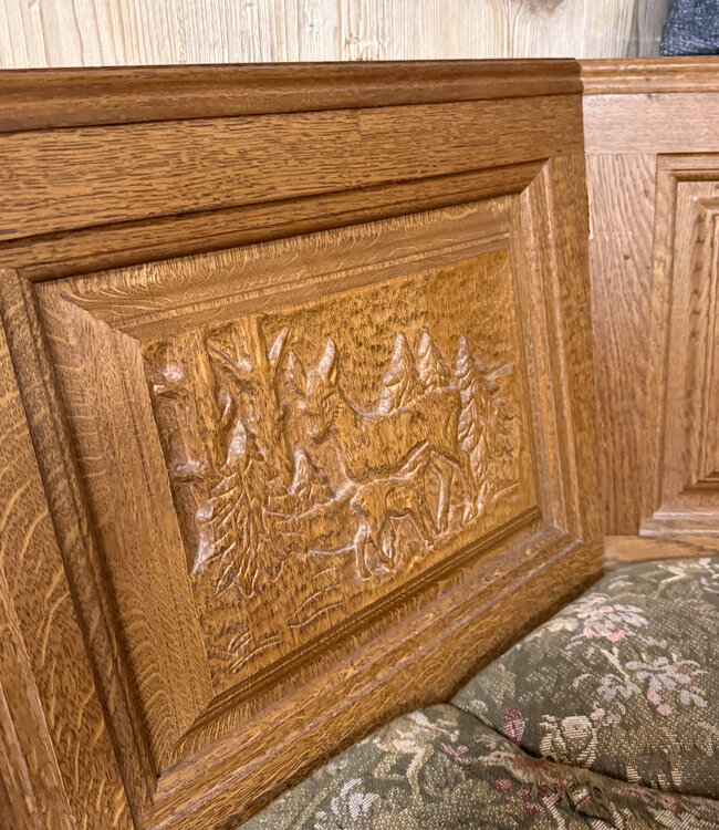 Austrian Stube dining area with hunting carvings