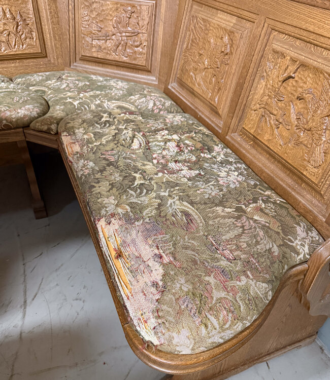 Austrian Stube dining area with hunting carvings