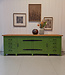 Vintage groene houten werkbank