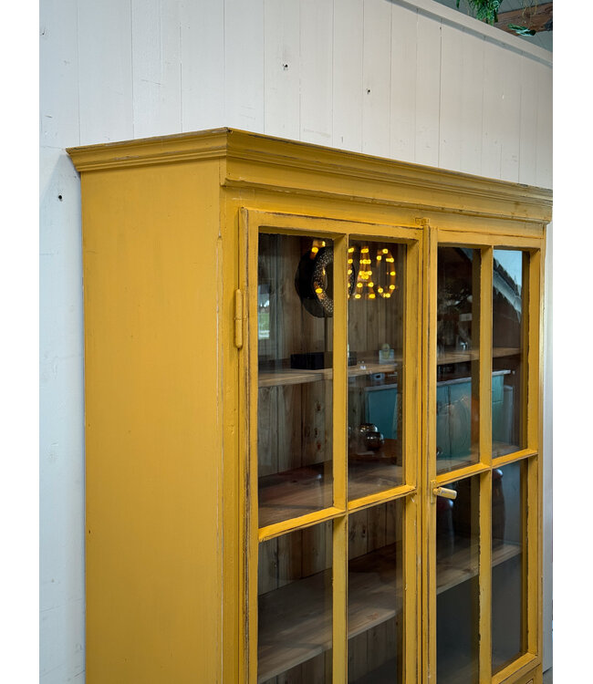 Vintage yellow display cabinet