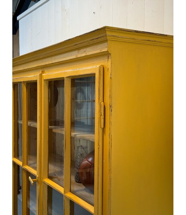 Vintage yellow display cabinet