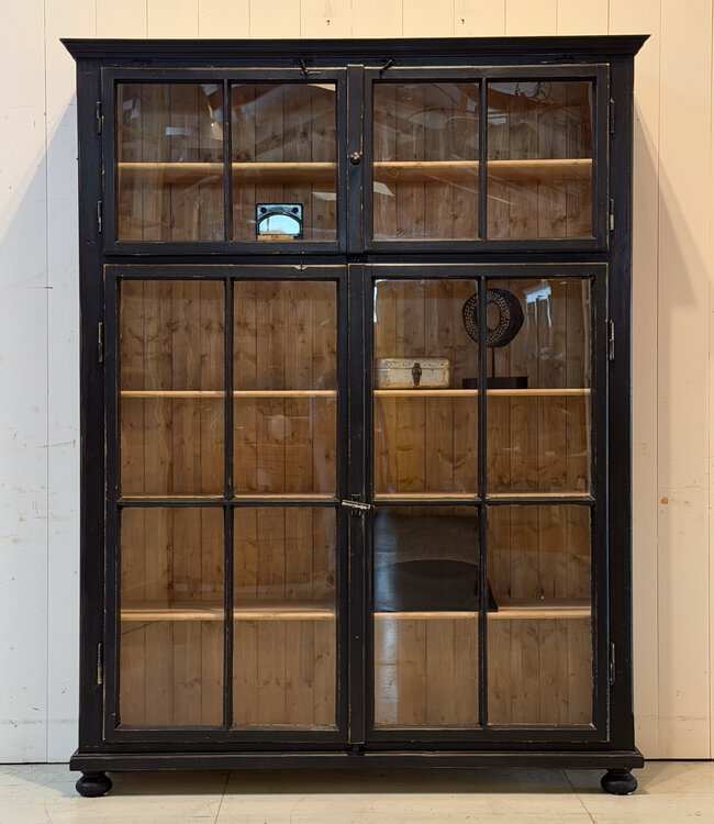 Vintage black display cabinet with old glass