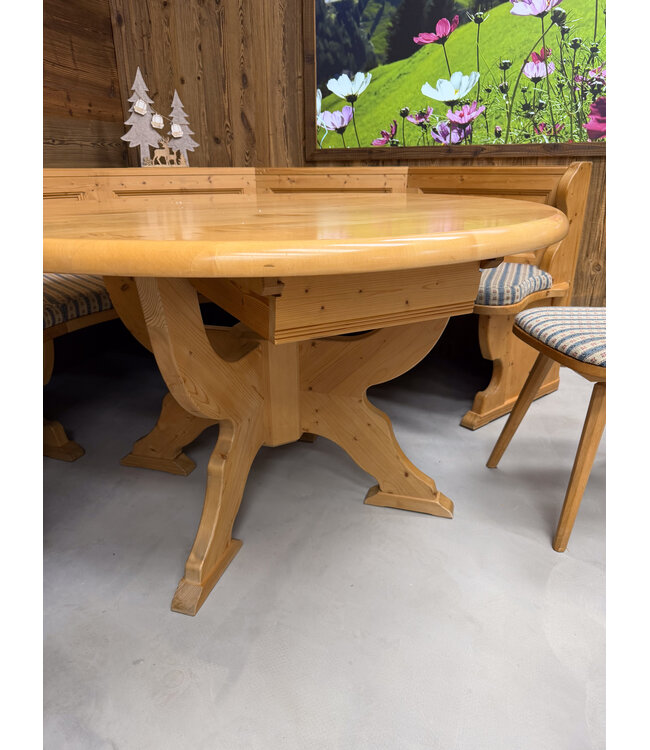 Stube circular seating | Austrian dining area | Round sofa + table and chairs