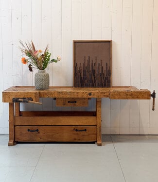 Vintage wooden workbench with drawers