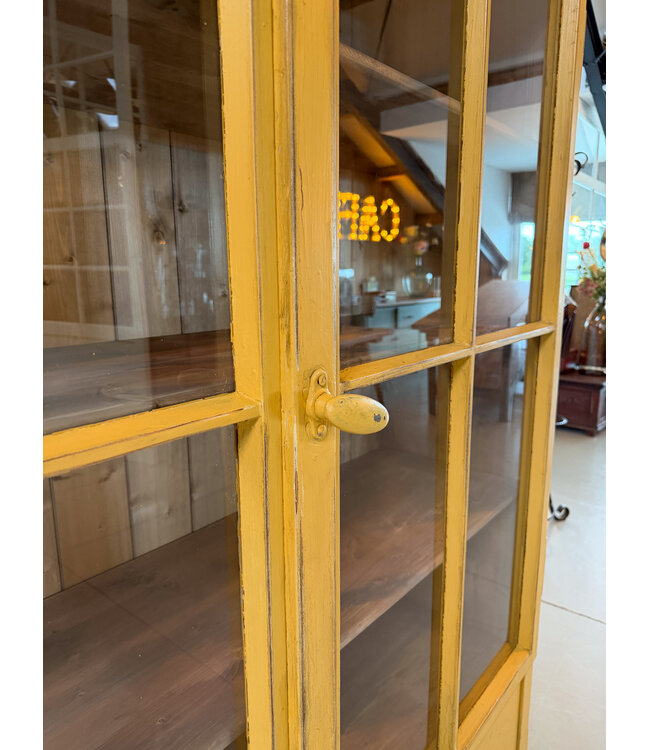 Vintage yellow display cabinet
