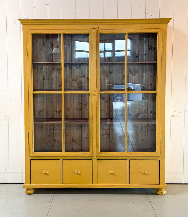 Vintage yellow display cabinet