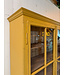 Vintage yellow display cabinet