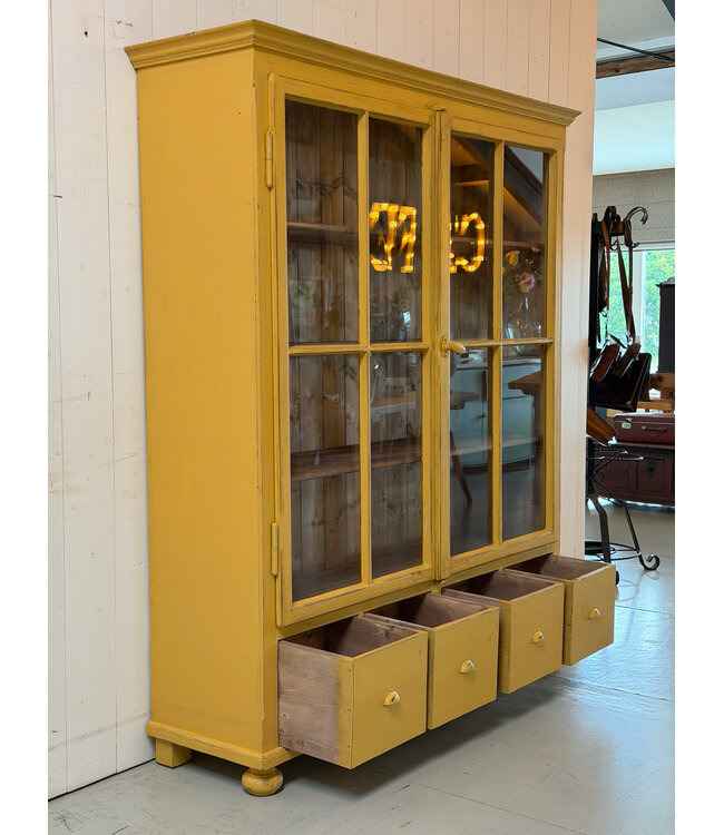 Vintage yellow display cabinet