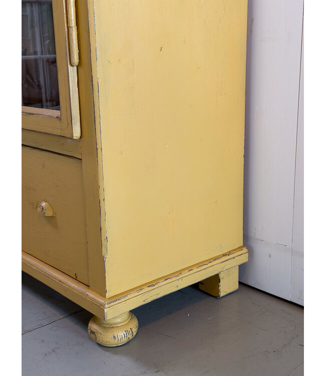 Vintage yellow display cabinet