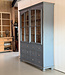 Vintage grey buffet cabinet with old glass | Display cabinet