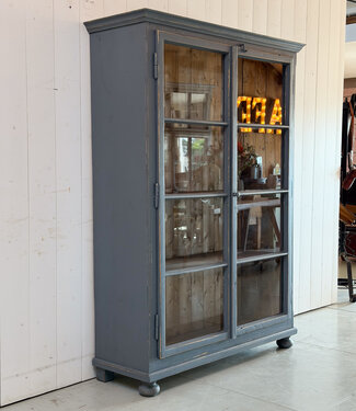 Grey vintage wooden buffet cabinet with old glass