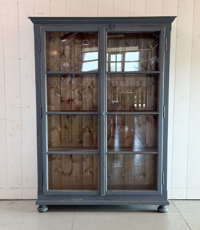 Grey vintage wooden buffet cabinet with old glass