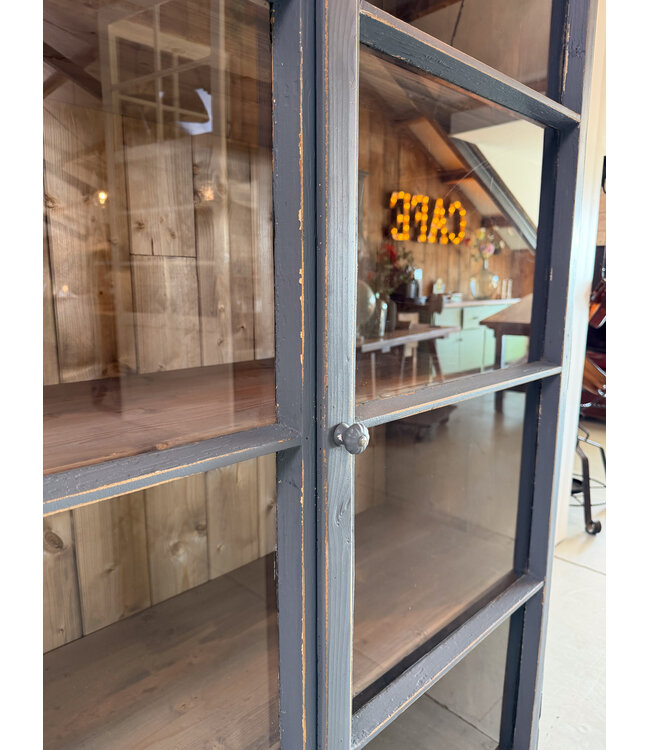 Grey vintage wooden buffet cabinet with old glass