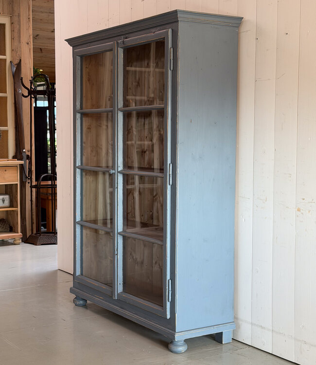 Grey vintage wooden buffet cabinet with old glass