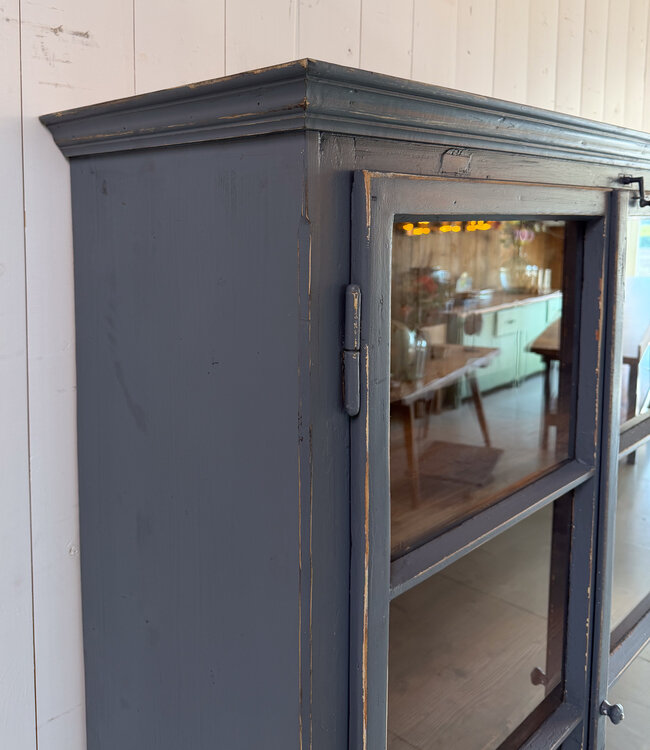Grey vintage wooden buffet cabinet with old glass