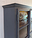 Grey vintage wooden buffet cabinet with old glass