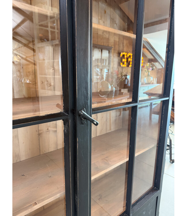 Vintage black wooden buffet cabinet with old glass