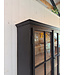 Vintage black wooden buffet cabinet with old glass