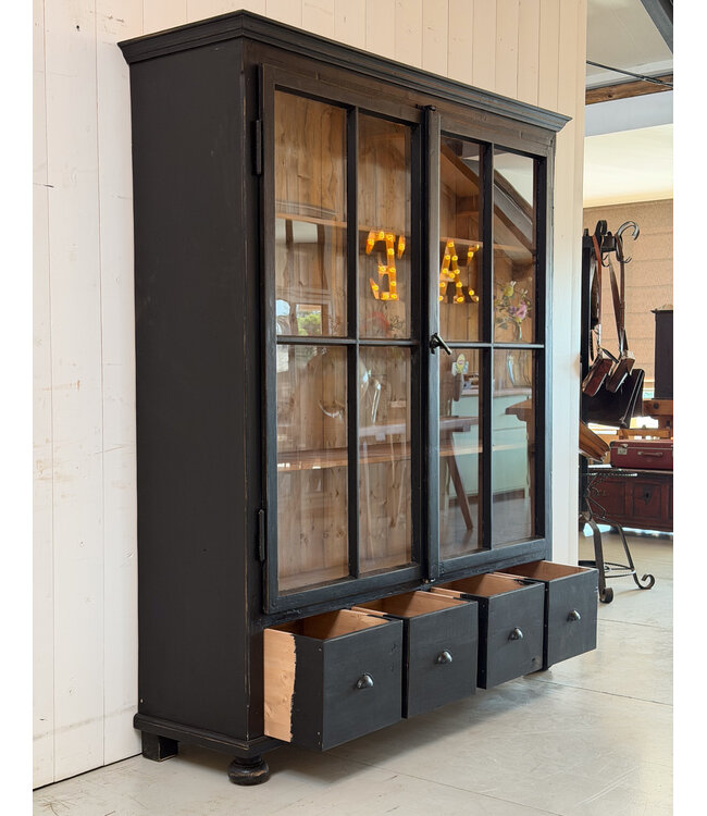 Vintage black wooden buffet cabinet with old glass
