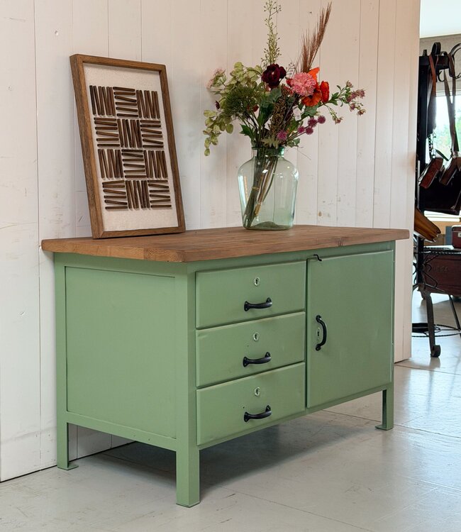 Green industrial workbench with door and drawers