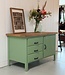 Green industrial workbench with door and drawers