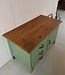 Green industrial workbench with door and drawers